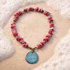 Coral and stainless steel details