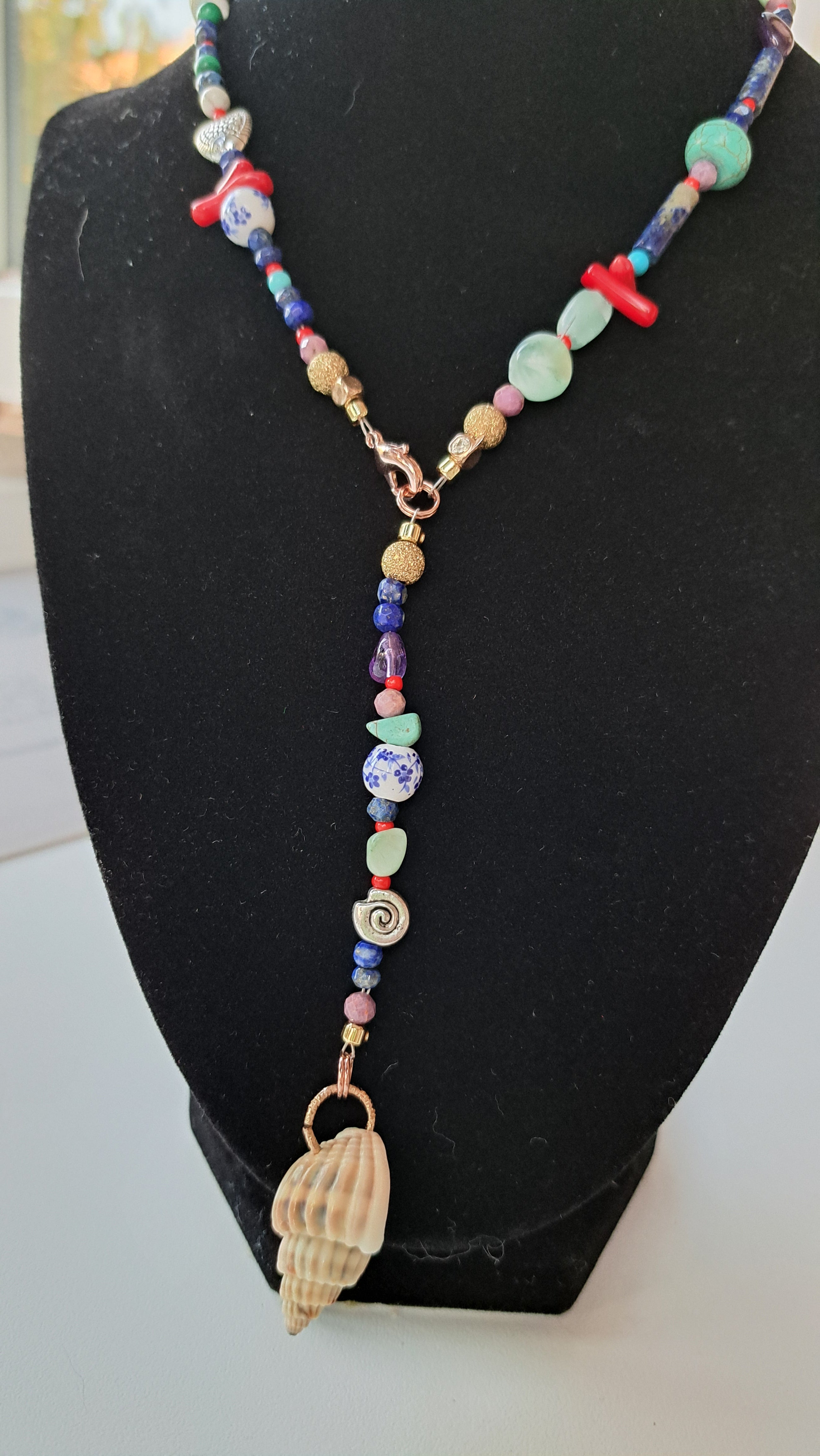 Mix of semi-precious stones and stainless steel marine details