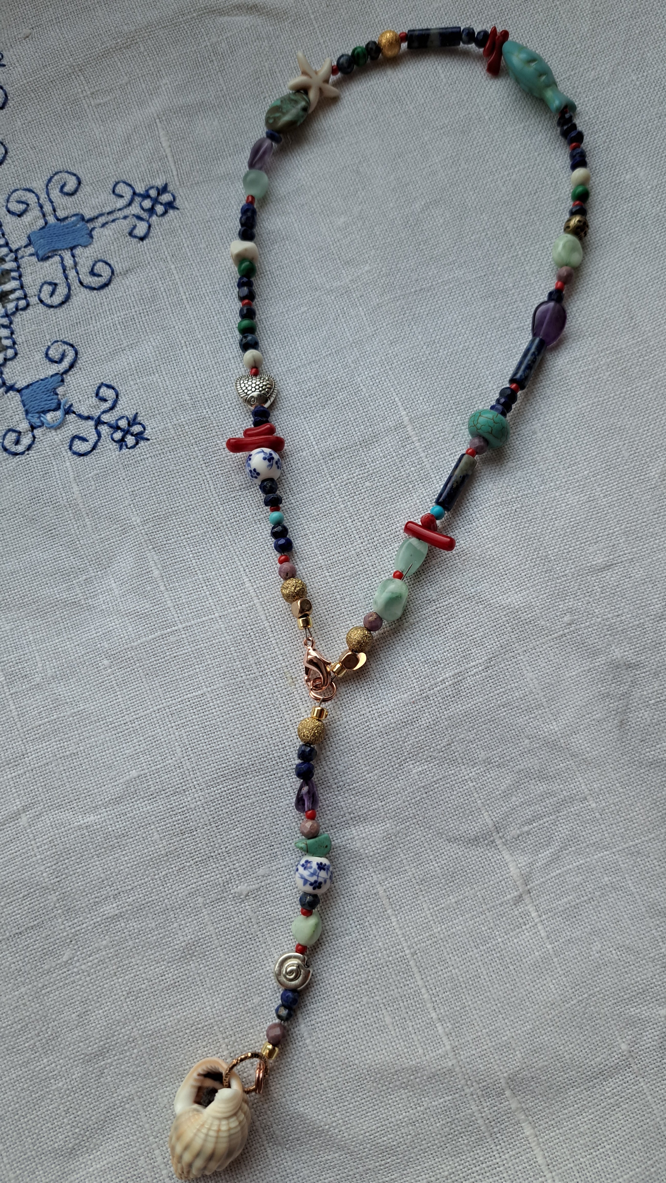 Mix of semi-precious stones and stainless steel marine details