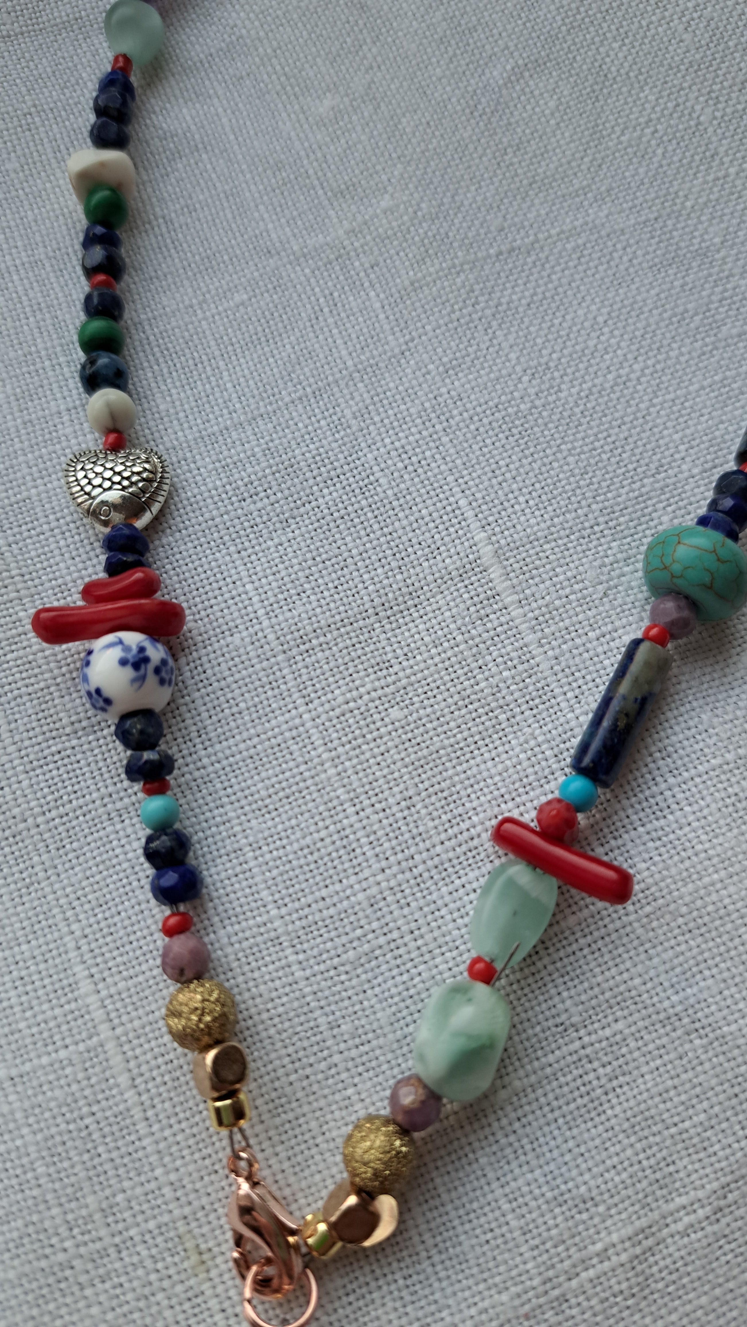 Mix of semi-precious stones and stainless steel marine details