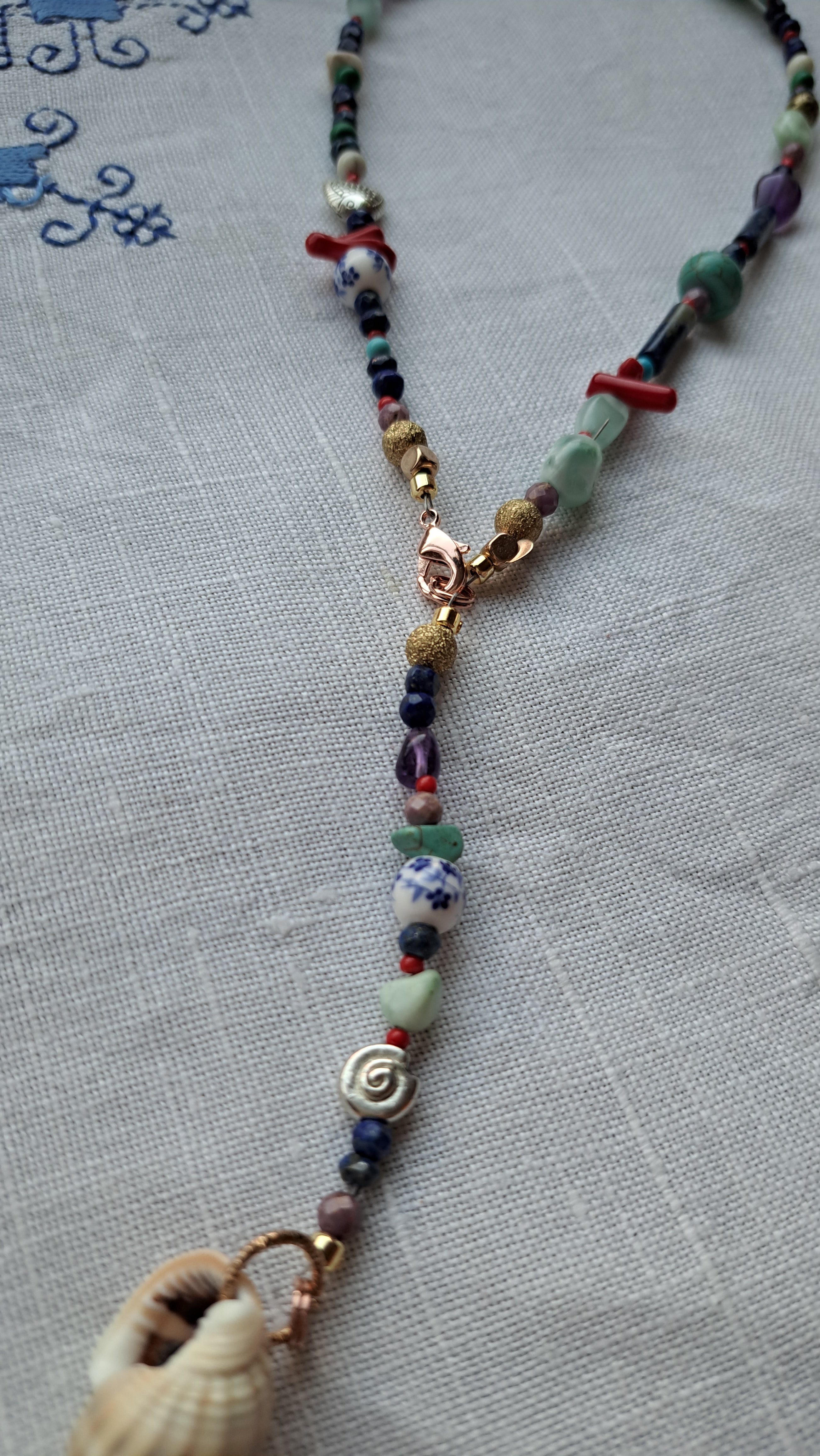Mix of semi-precious stones and stainless steel marine details