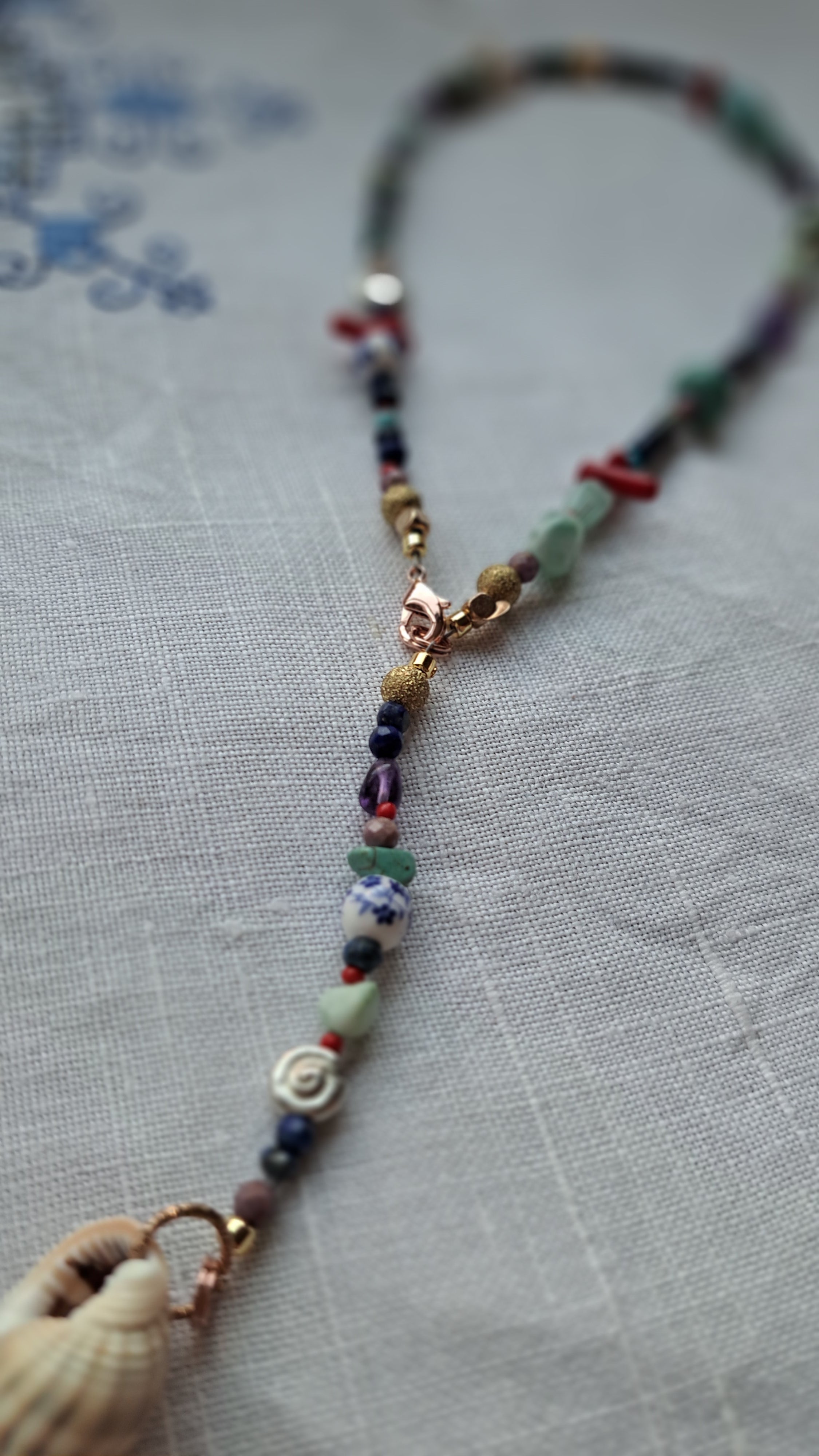 Mix of semi-precious stones and stainless steel marine details