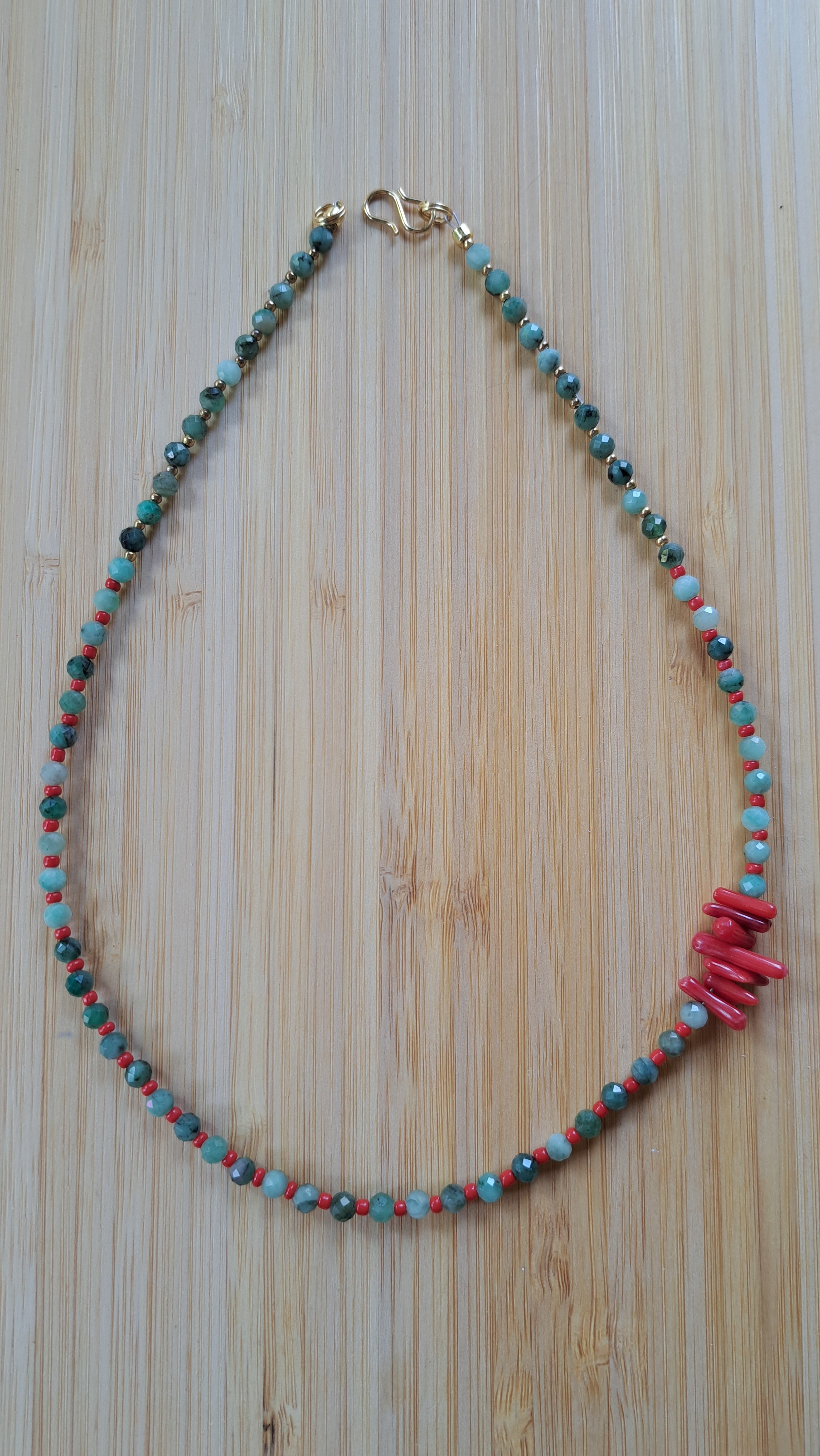 Emerald and synthetic coral 