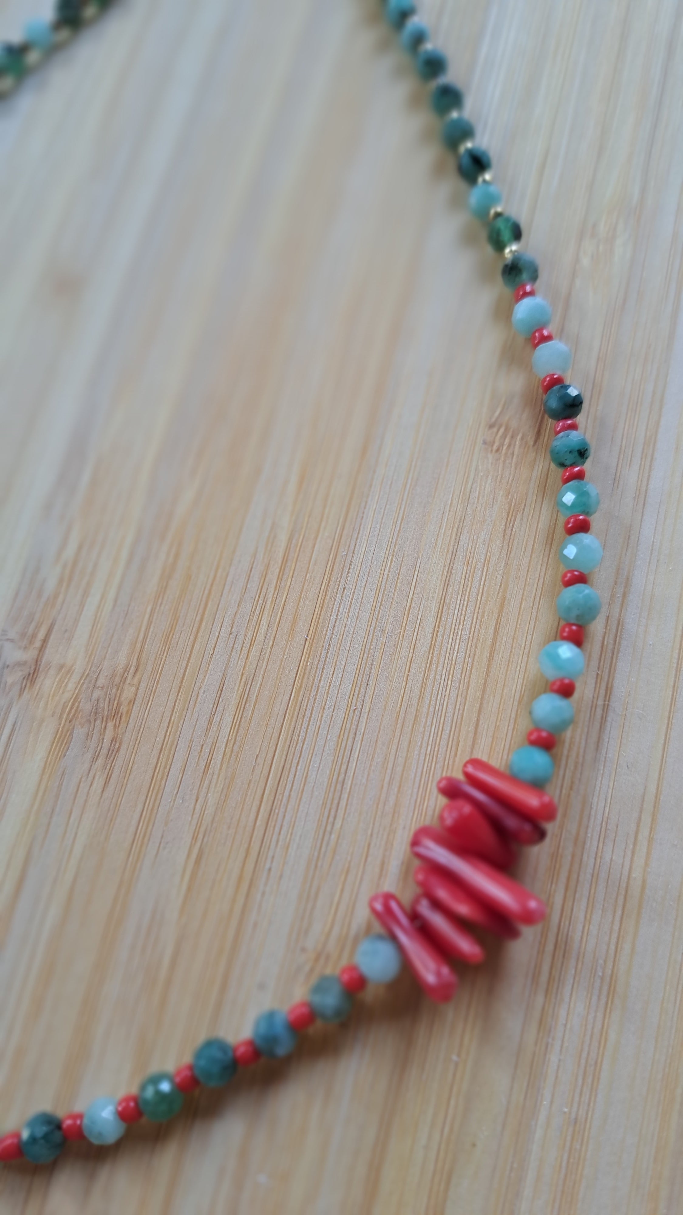 Emerald and synthetic coral 
