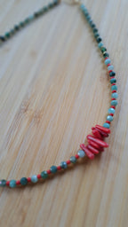 Emerald and synthetic coral 