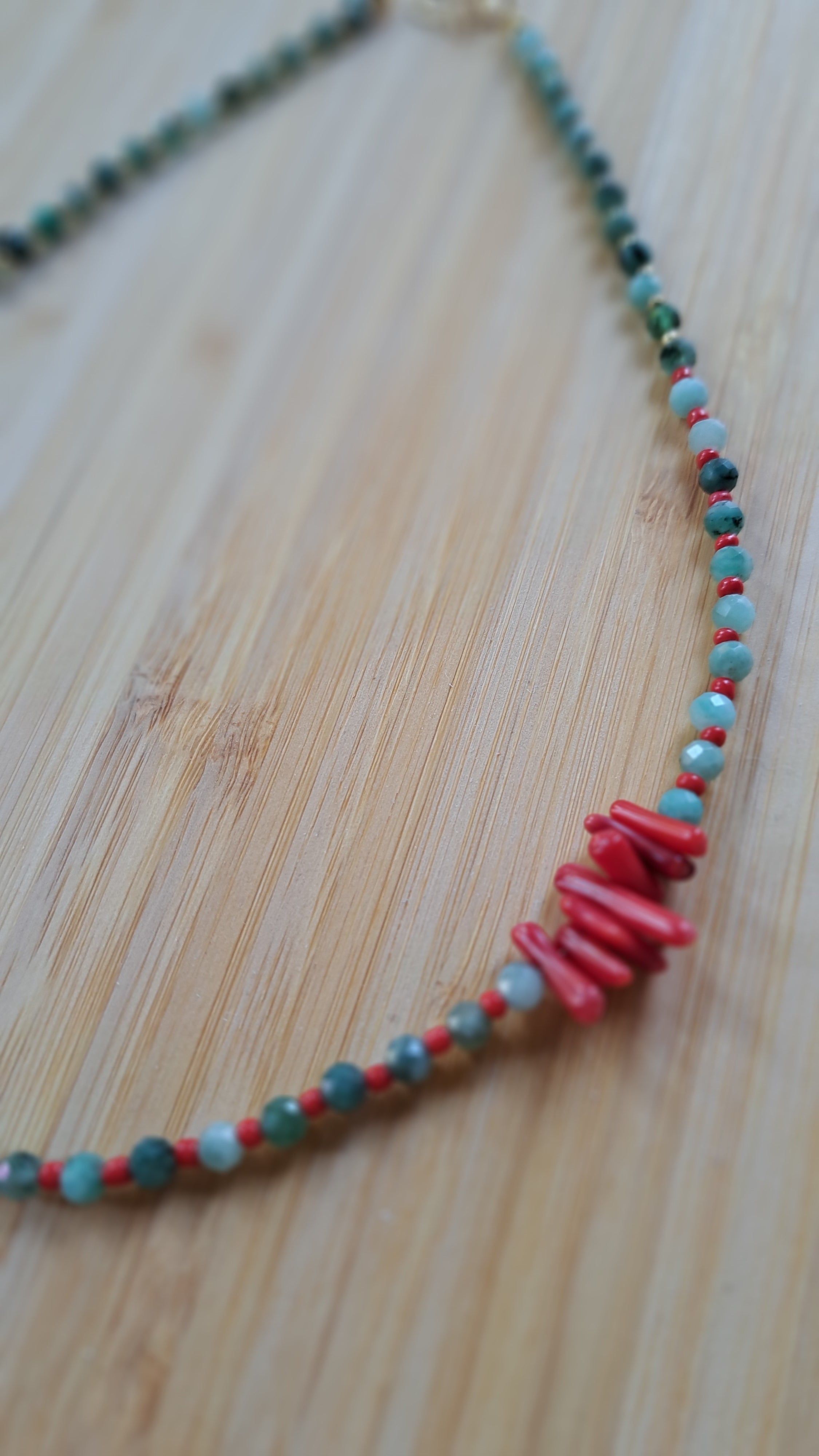 Emerald and synthetic coral 