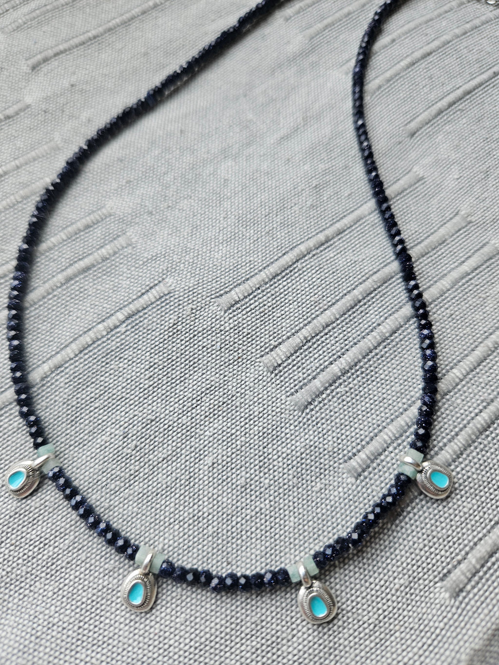 Goldstone and larimar