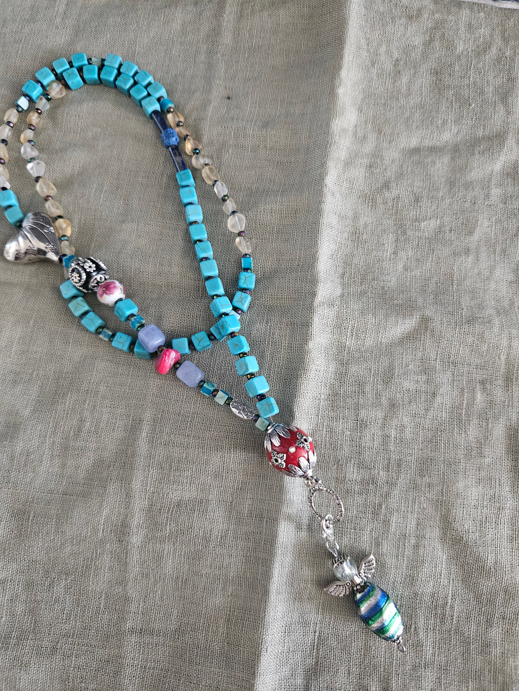 Synthetic turquoise, citrine and Indonesian details 