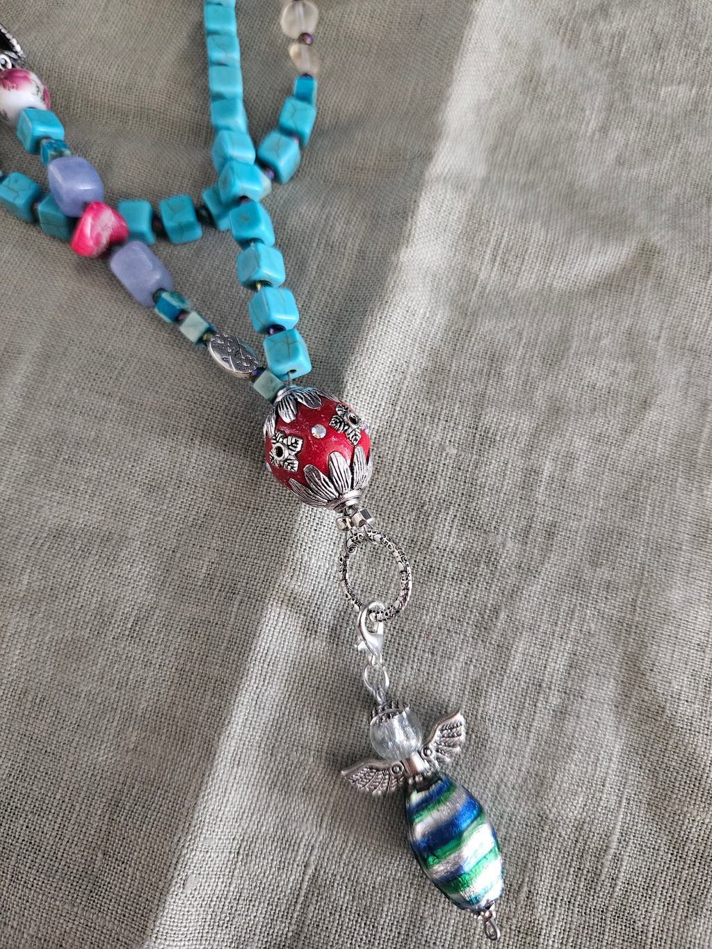 Synthetic turquoise, citrine and Indonesian details 