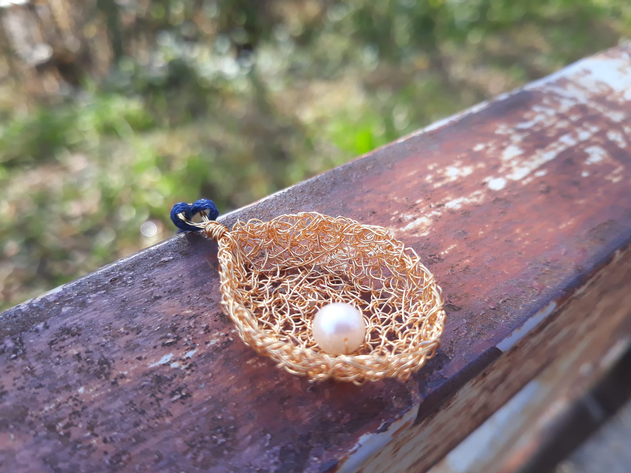 Crochet lace necklace made of copper wire and semi-precious stones