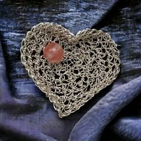 Crocheted lace brooch made of copper wire and semi-precious stones 