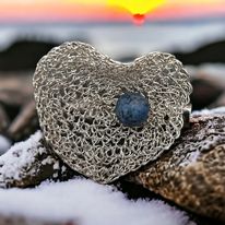 Crocheted lace brooch made of copper wire and semi-precious stones 