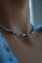 Necklace of blue crystals, cultured pearls and hematite