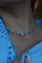 Necklace of blue crystals, cultured pearls and hematite