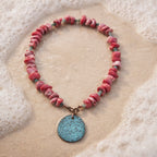 Coral and stainless steel details