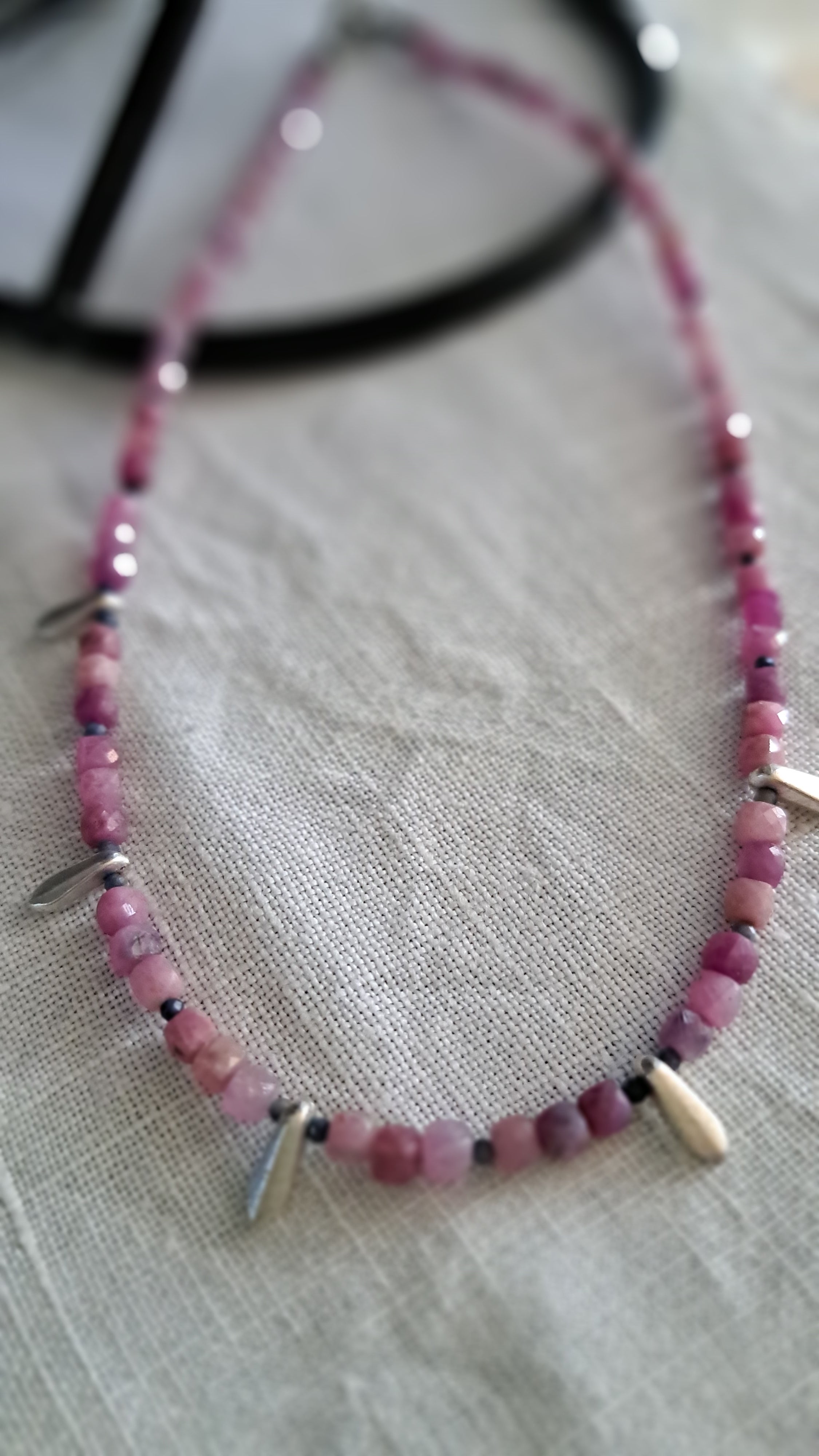 Ruby, sapphire and stainless steel